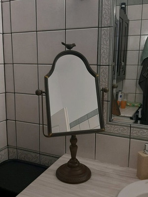 Reclining mirror used, bronze with patina and aged effect