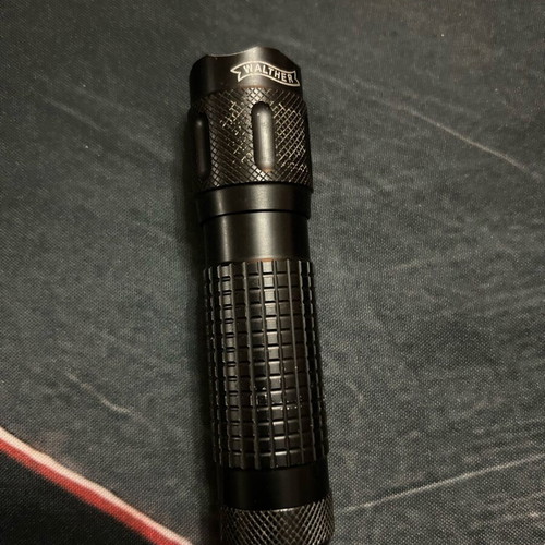 Walther STL100C handheld flashlight used, non-working, LED, for parts only