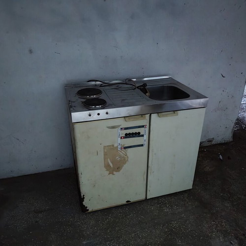 Fridge, kitchen unit and sink used, needs external paint