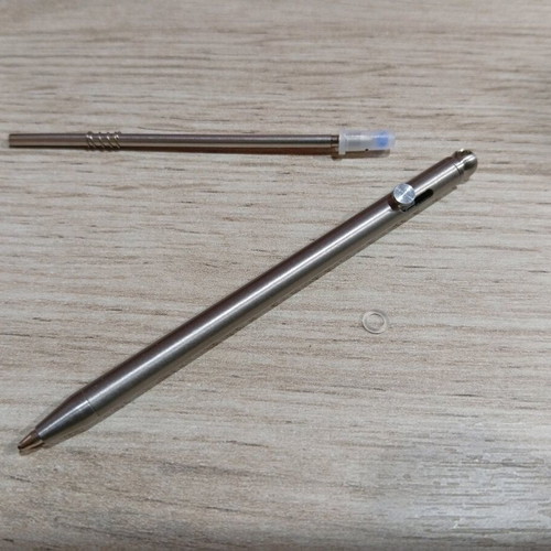 Mini titanium pen like new