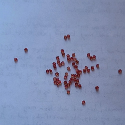 Small beads new, transparent red, 100 grams