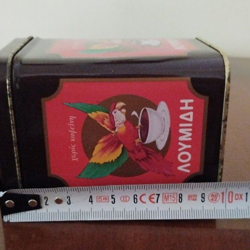 Collectible metal Loumidis Papagalos Greek coffee tin used