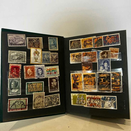 Stamp album with various collectible stamps used, 19x14.5 cm