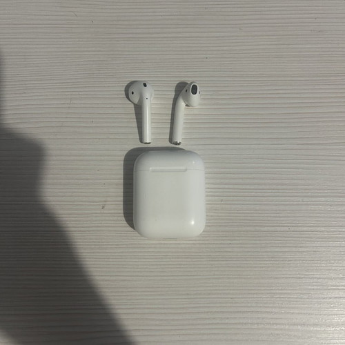 Apple AirPods 2nd Generation used, model A1602 with wired charging case