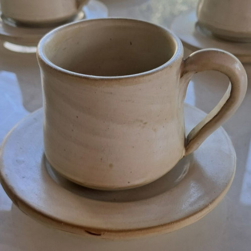Porcelain coffee cup set with saucers, milk jug and sugar bowl
