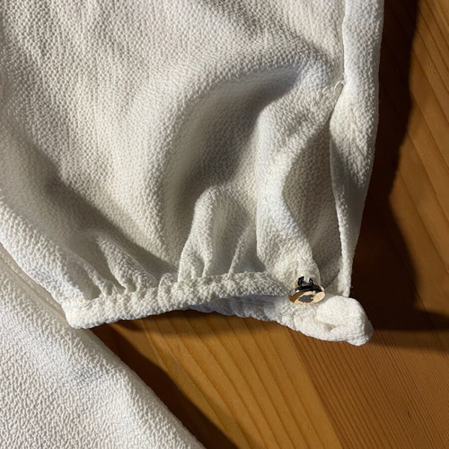 White blouse Made in Italy with ruffles and cuff buttons used
