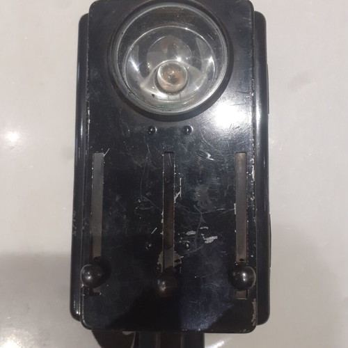 Artas soldier flashlight used, 1950s black with red and green filter