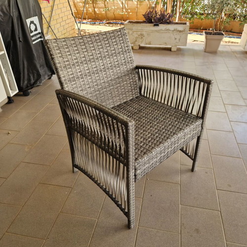 Garden sofa set with cushions and table
