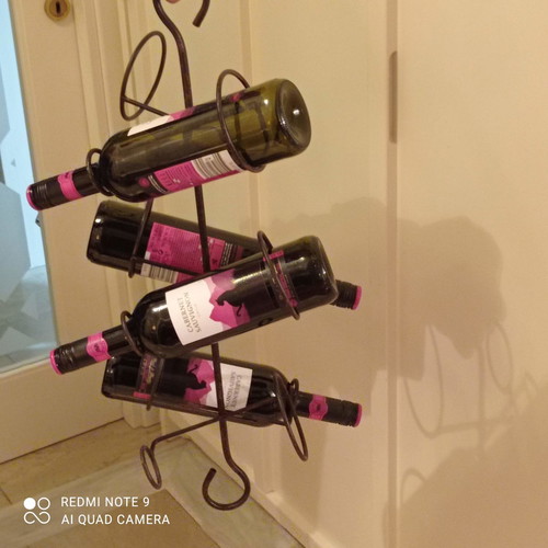Hanging wine rack used, handmade iron