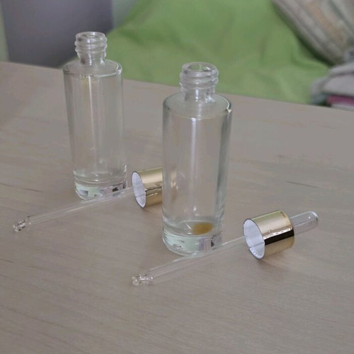Glass jars and bottles like new with lids and droppers
