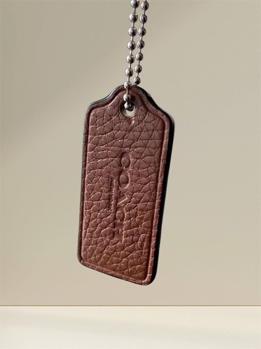 Coach leather hangtag bag charm brown… - € 13,00 - Vendora.cy
