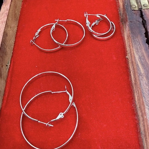 Steel hoop earrings new in silver color