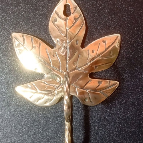 Vintage brass wall hook with leaves used