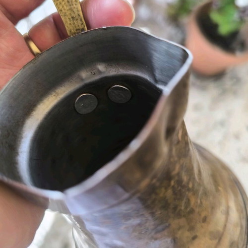 Handmade old copper briki for Greek or Turkish coffee used