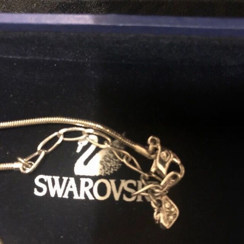 Swarovski pink cross necklace like new with crystals