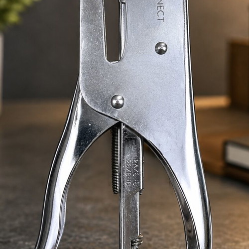Q-Connect metal hand stapler used for office documents