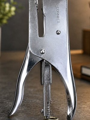 Q-Connect metal hand stapler used for office documents