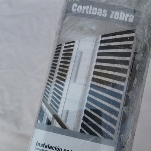 Zebra roller blind system