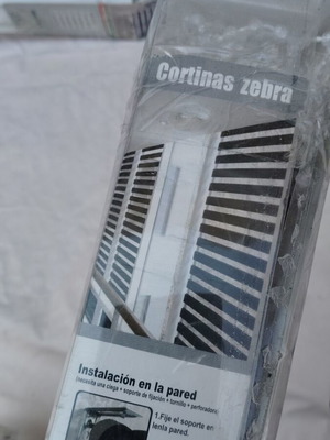 Zebra roller blind system