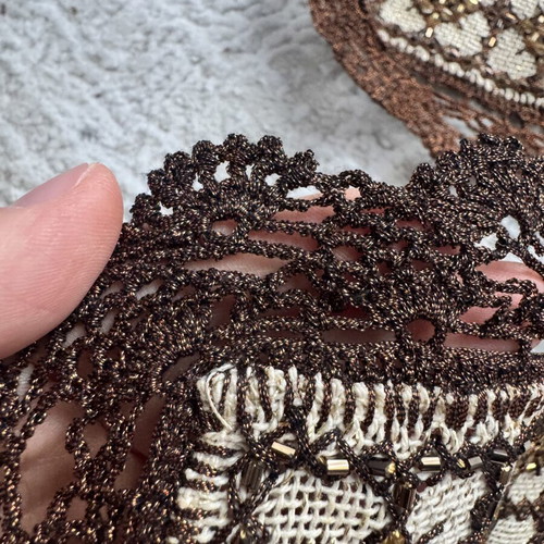 Vintage coasters used with lace and decorative beads in brown-bronze