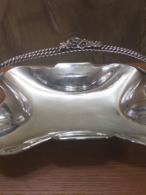 Silver-plated fondant dish used with decorative handle and feet
