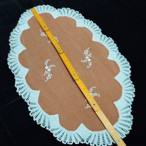 Handmade embroidery with crochet lace used