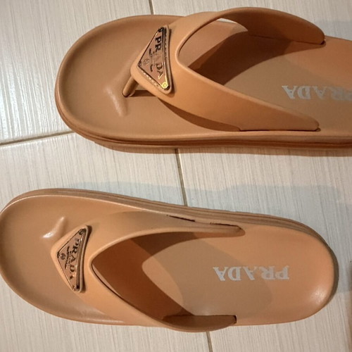 Prada women's nude flip flops size 37/38
