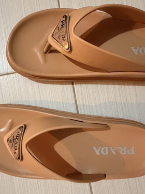 Prada women's nude flip flops size 37/38