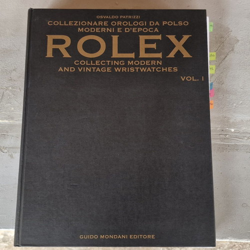 Rolex catalog large book like new in Italian and English