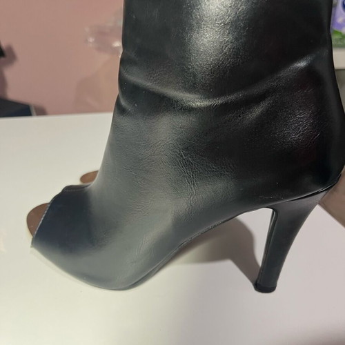Migato black boots with 10 cm heel like new