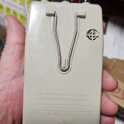 Vintage DDR electrical tool shaped like a flashlight used