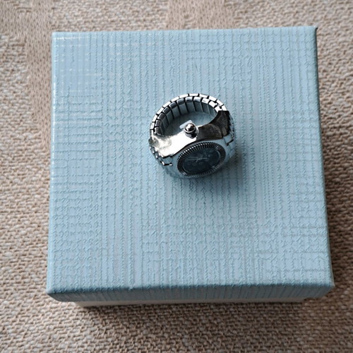Ring watch quartz like new with black dial and silver bracelet