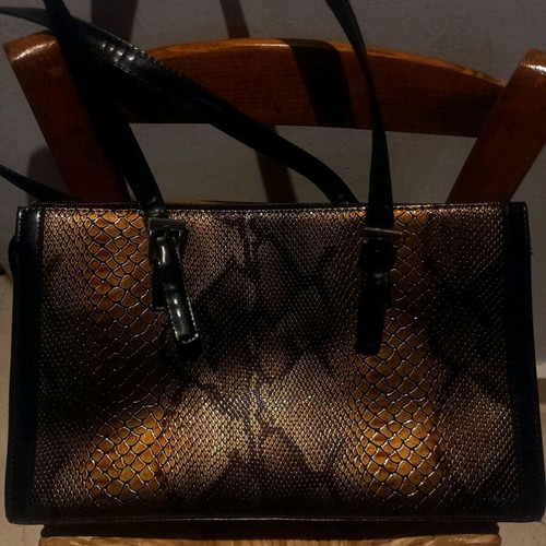 Shoulder bag like new with snake pattern