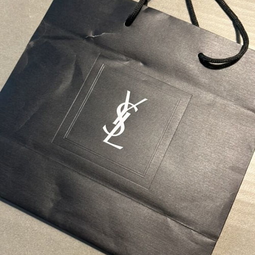 Yves Saint Laurent bag used with small tear