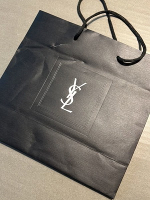 Yves Saint Laurent bag used with small tear