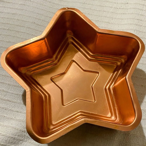 Copper star-shaped baking mold used, vintage