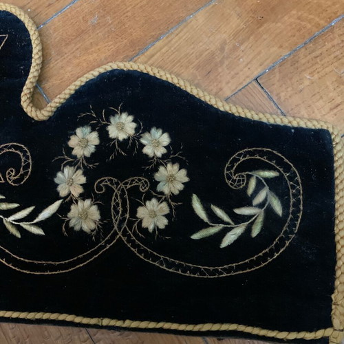 Traditional embroidery used, dark velvet