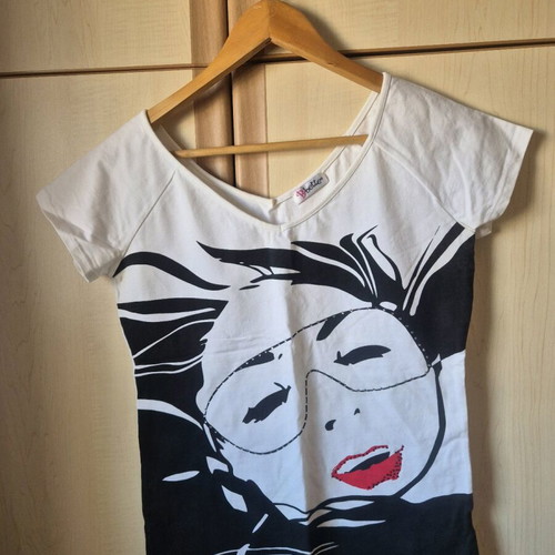 White Bette blouse with black design and rhinestones used, size M