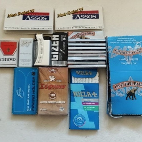Vintage smoking collection with lighters, filters & rolling papers
