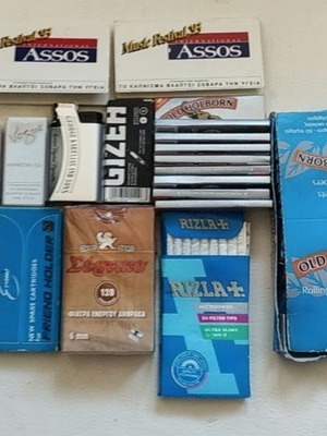 Vintage smoking collection with lighters, filters & rolling papers