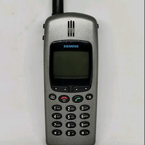 Siemens C25 vintage mobile phone used, with original charger, non-functional