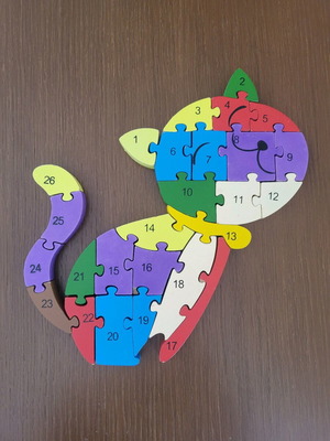 Wooden educational cat puzzle like new with numbers and English letters