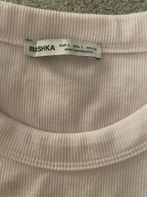 Bershka T-shirt large with faint pink shade, worn once