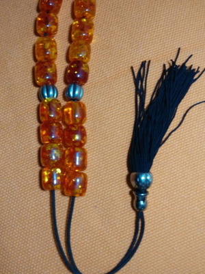 Vintage komboloi used with silver elements and amber imitation
