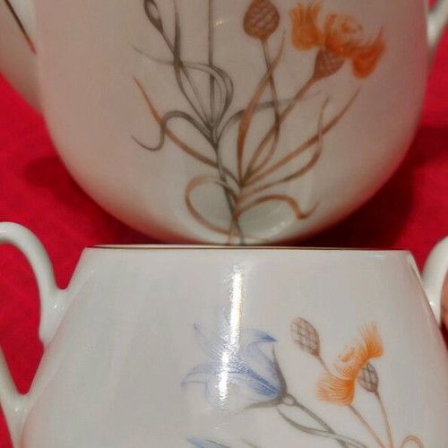 Bohemian porcelain teapot and sugar bowl like new, white with gold trim and floral design
