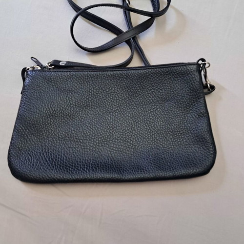 Handmade leather crossbody bag with urban design