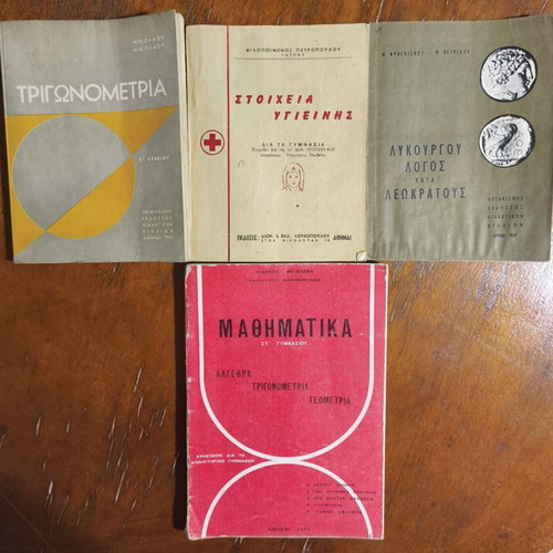 School books used with wear and notes, various years