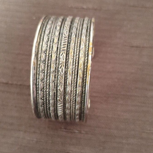 Bracelet wide handmade cuff with embossed ethnic design used, silver finish