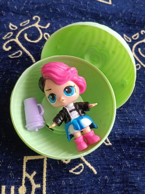 Doll figure from ball toy, black-pink hair, blue eyes