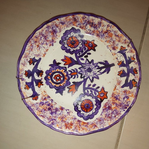 Handpainted vintage wall plate with beautiful design